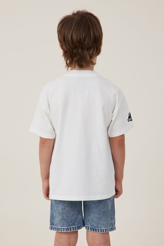 Camiseta - Jurrasic World License Drop Shoulder Short Sleeve Tee, LCN UNI VANILLA/JURASSIC WORLD FRIENDS