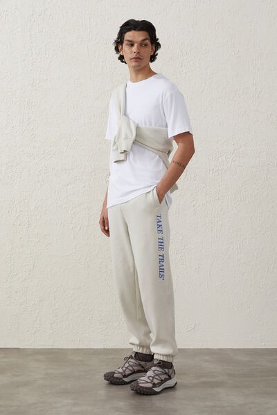 Active Graphic Loose Fit Trackpant, IVORY / TAKE THE TRAILS