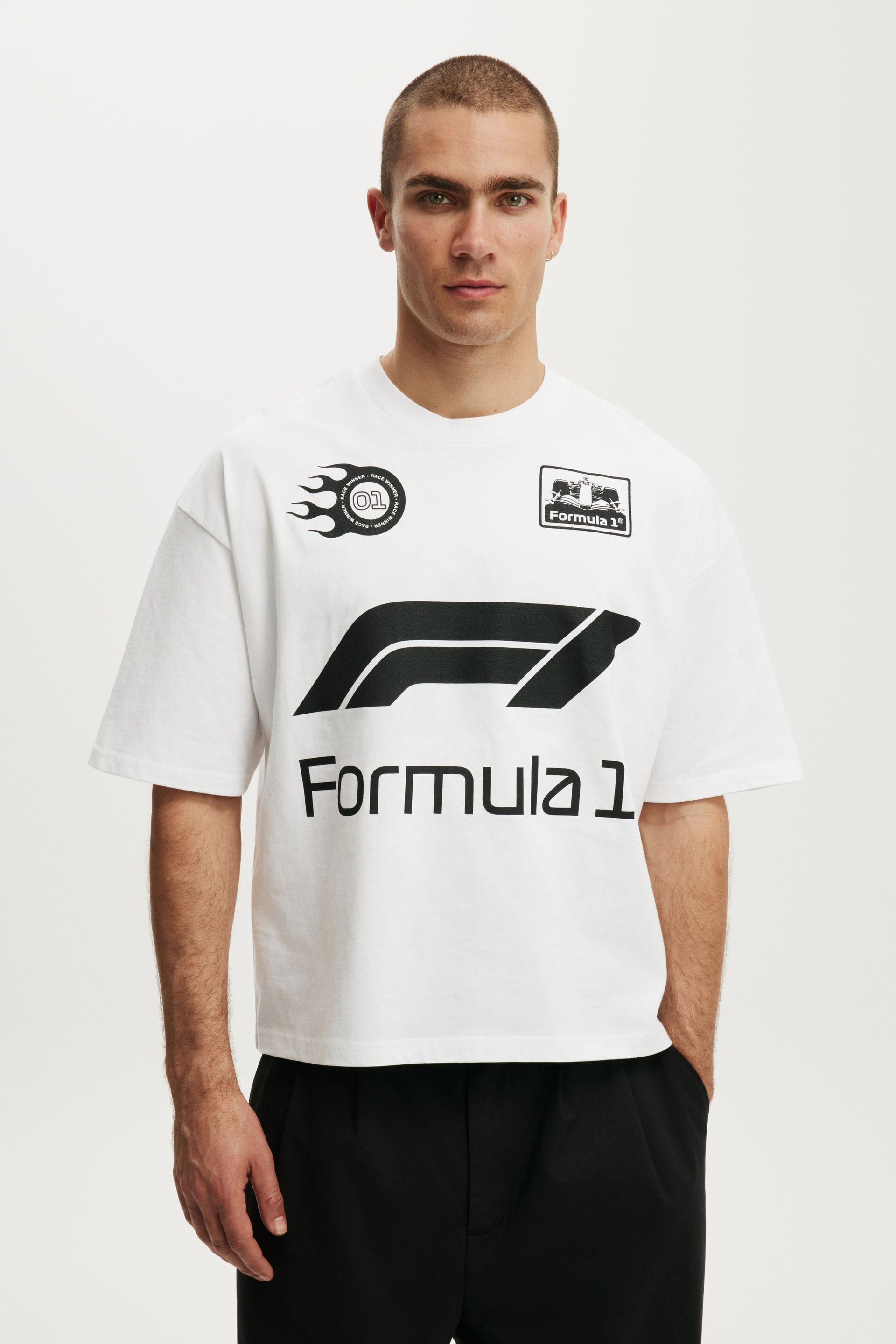 Unisex White F1 Cropped Fit T-Shirt | Cotton On United States