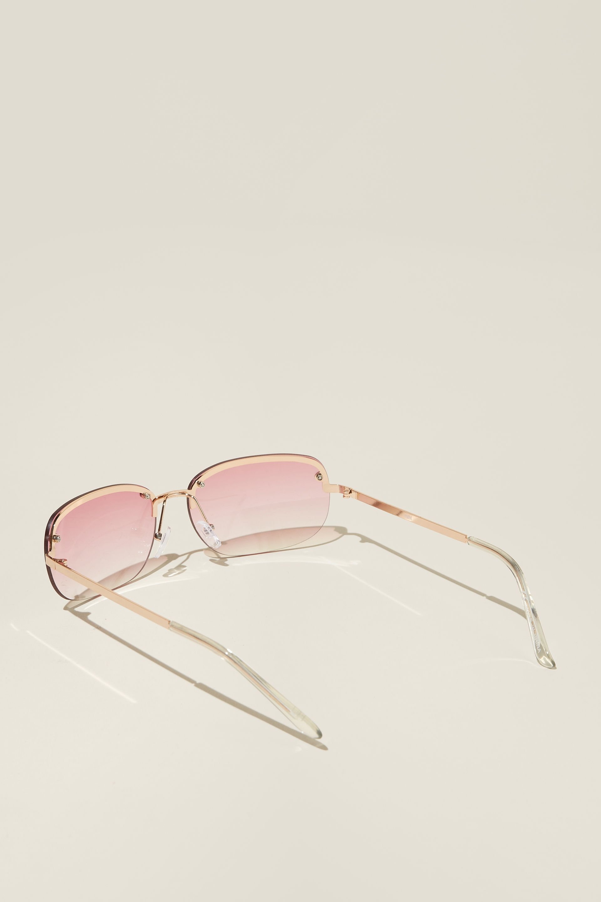 Buy 90s Vintage Oval Sunglasses. Minimal Small Frameless 20s Style Pink  Lens With Bright Chrome Metal Arms and Trim. Unused NOS Micro Online in  India - Etsy