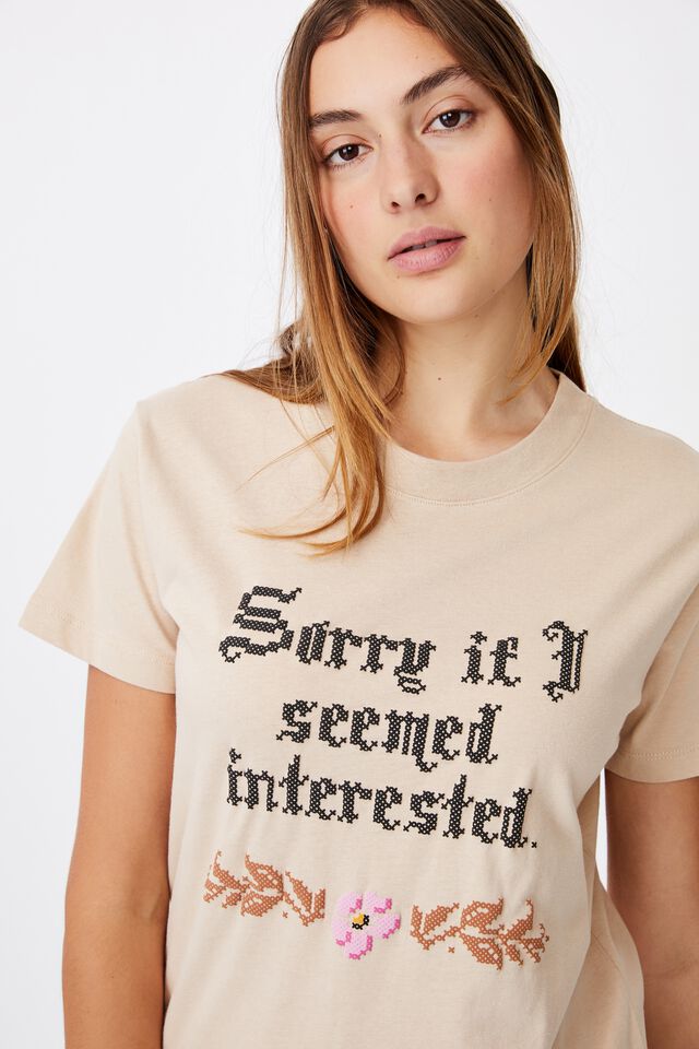 Classic Slogan T Shirt, NOT INTERESTED/SAND DUNE