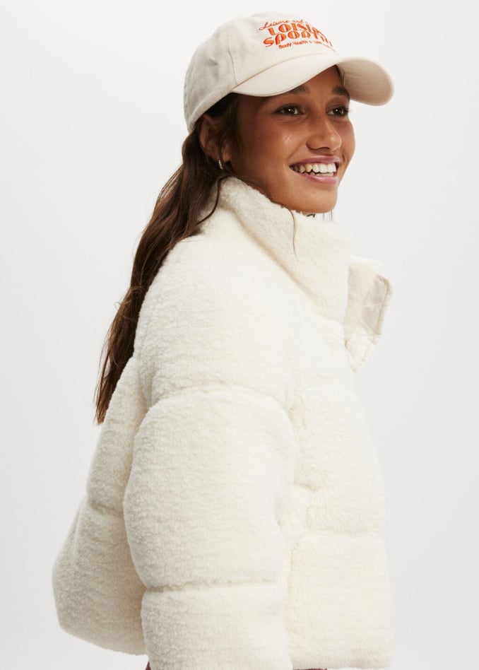 The Mother Puffer Cropped Sherpa Jacket. Click to shop