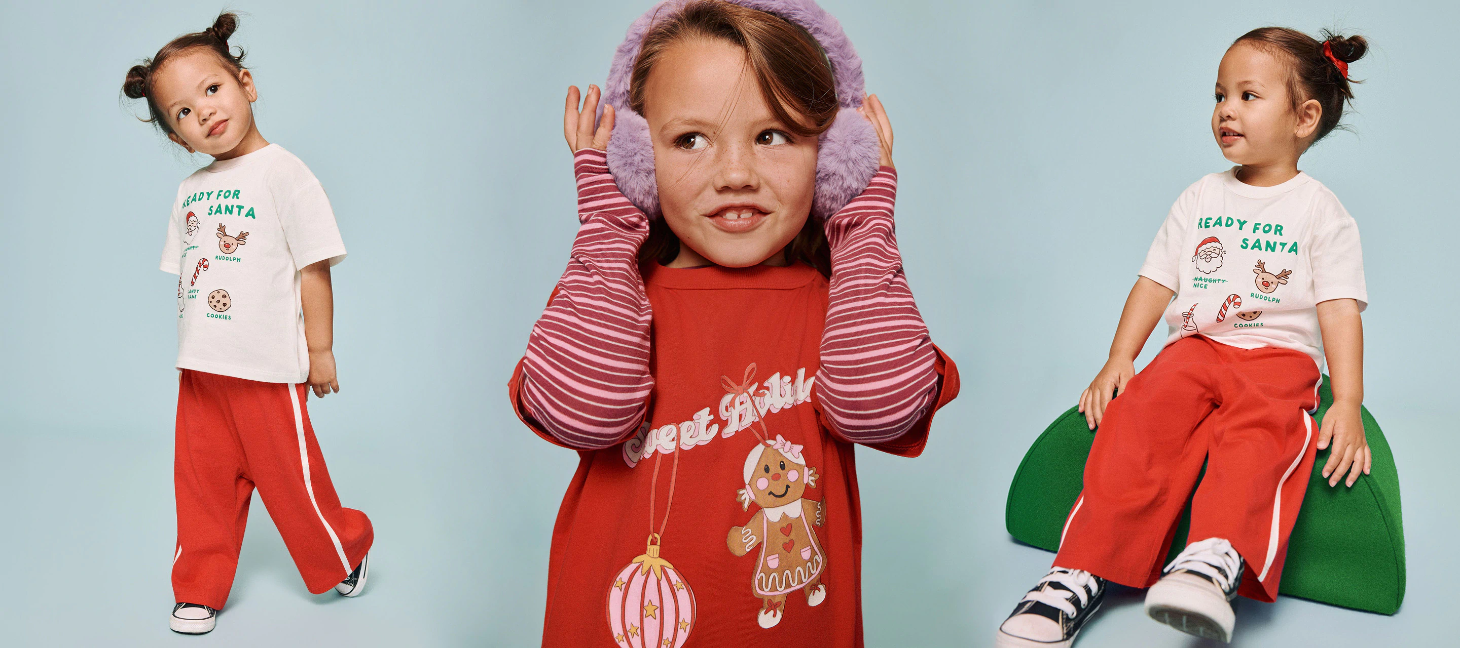 Three young children wearing colorful casual tops against a light gray background. Left: girl in blue striped shirt and beige hat. Center: boy in gray motorcycle graphic tee. Right: boy in cream "Fresh Fruit" sweatshirt with green stripes