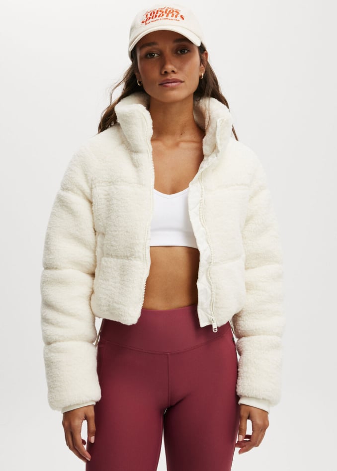 The Mother Puffer Cropped Sherpa Jacket. Click to shop