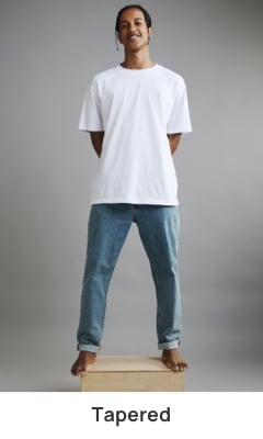 Click to shop Tapered Jeans.