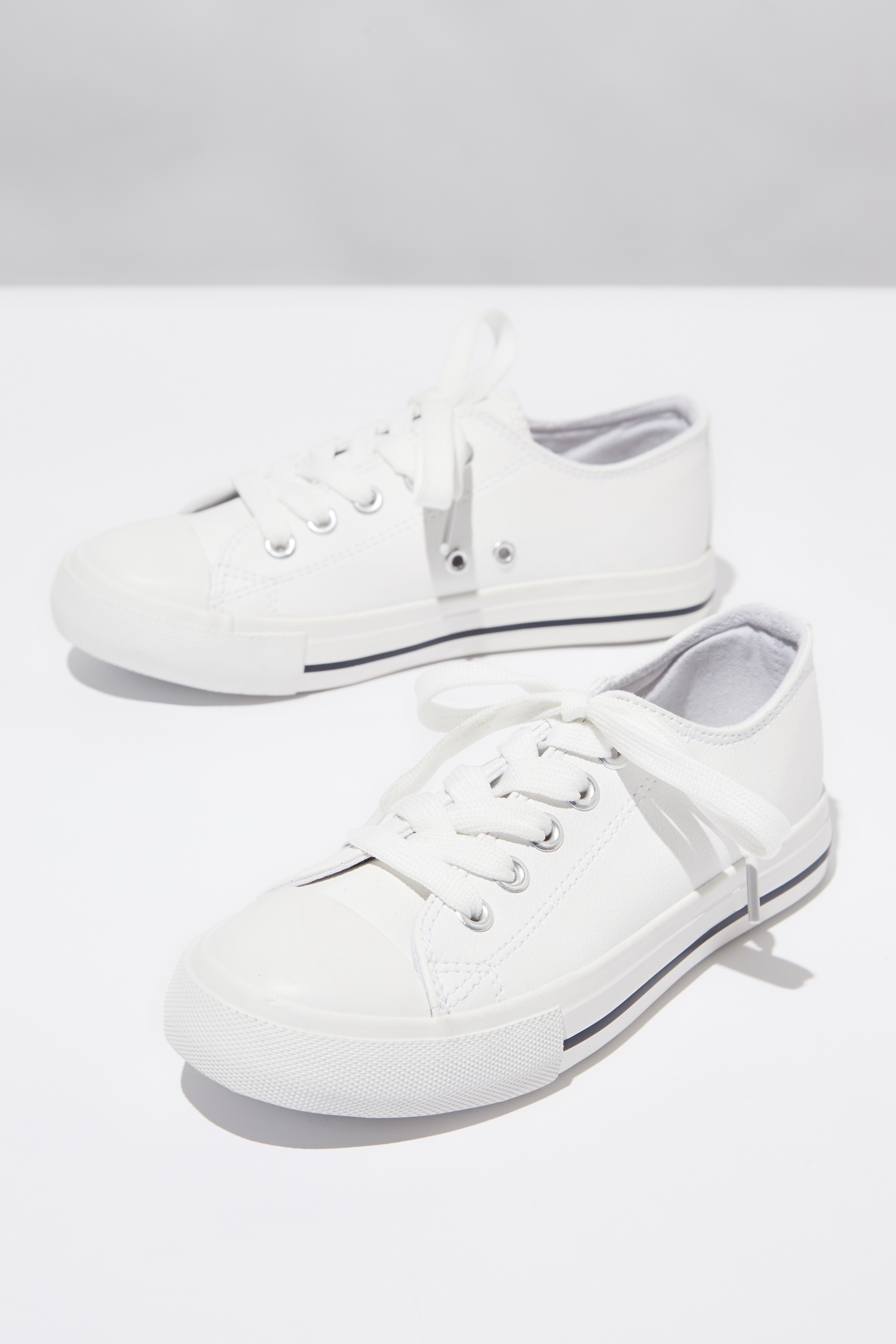 kids all white trainers