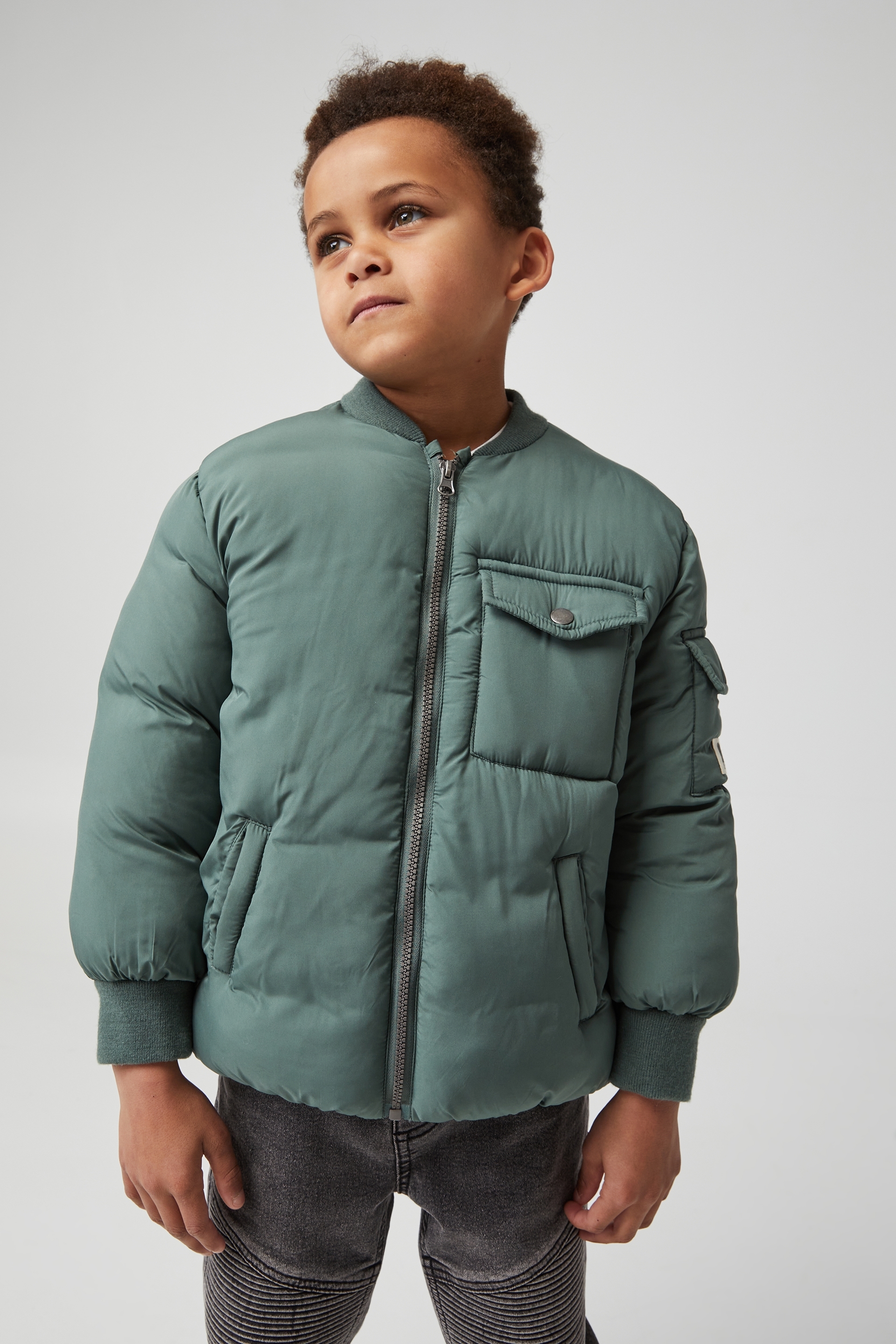 green padded bomber jacket